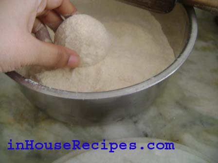 Mooli Parantha- sprinkle flour on the ball of dough